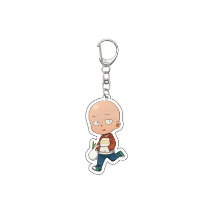 A clear acrylic one punch man saitama keychain with 55mm plate featuring cartoon character in orange hoodie holding vegetables