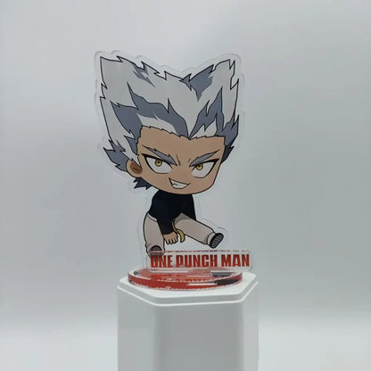 Chibi style saitama acrylic stand featuring spiky silver hair on a clear base with one punch man logo in red