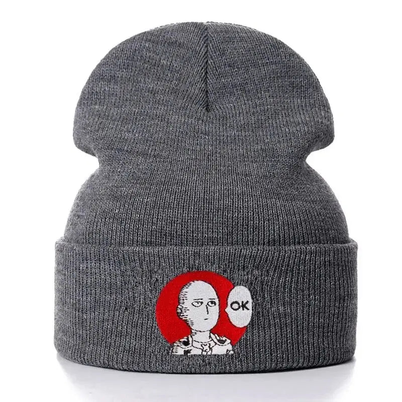 Gray cotton knitted one punch man saitama beanie with embroidered design and red circular background featuring ok speech bubble