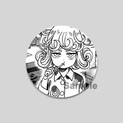 Circular black-and-white punch man saitama brooch pin featuring an anime-style character with curly hair and collared shirt