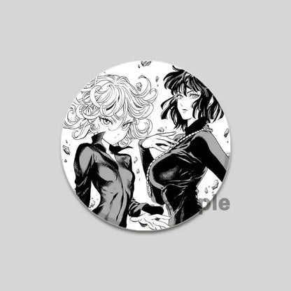 Black and white circular punch man saitama brooch pin featuring two anime characters in dynamic pose with detailed shading