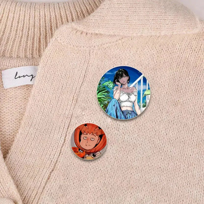 Two circular punch man saitama brooch pins featuring a black-haired woman in blue and an orange-haired surprised man