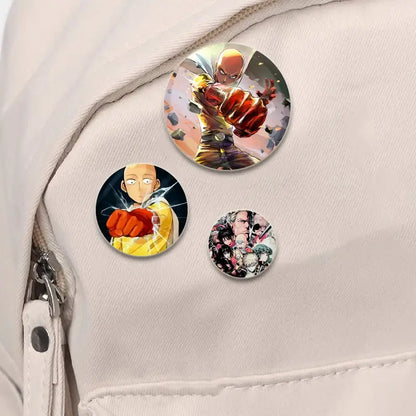 Three vibrant circular punch man enamel badge lapel pins featuring saitama with glossy anime artwork