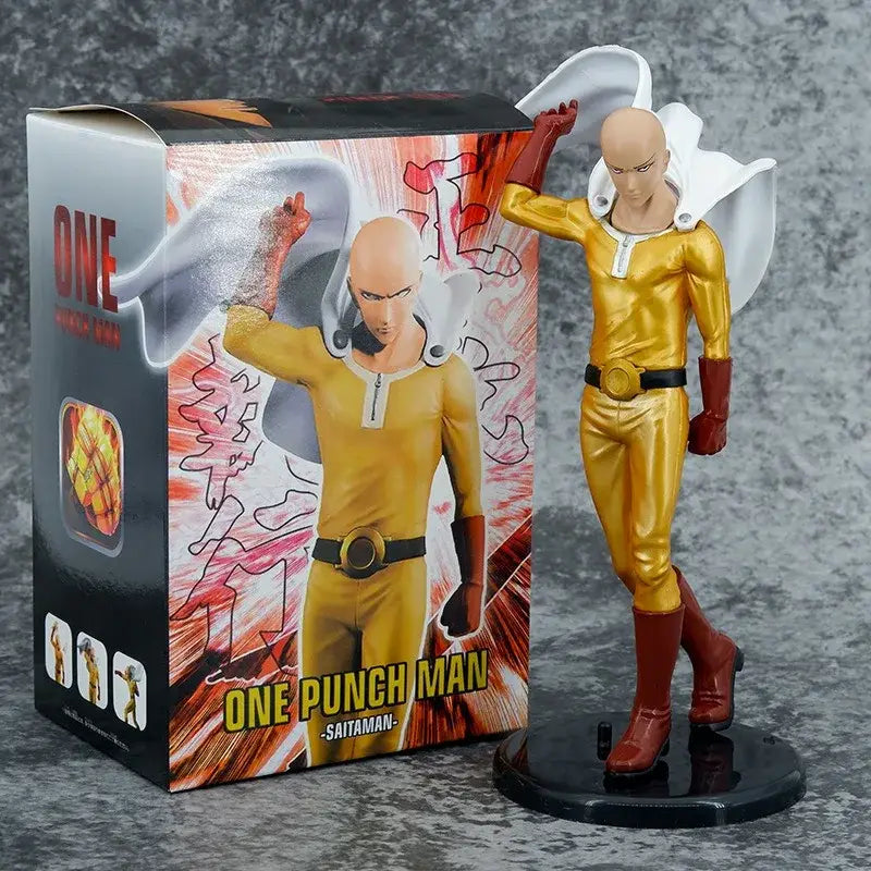 One punch man saitama pvc action statue in gold and red with flowing cape on black base standing 21cm tall
