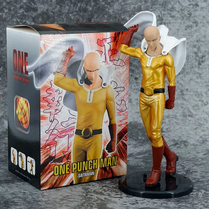 One punch man saitama pvc action statue in gold and red with flowing cape on black base standing 21cm tall