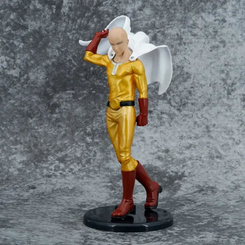 One punch man saitama pvc action statue 21cm featuring golden and red figure with flowing cape on black base