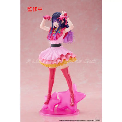 Oshi no ko ai pvc figure featuring a pink and purple anime character in a frilly outfit with red gloves on a star base