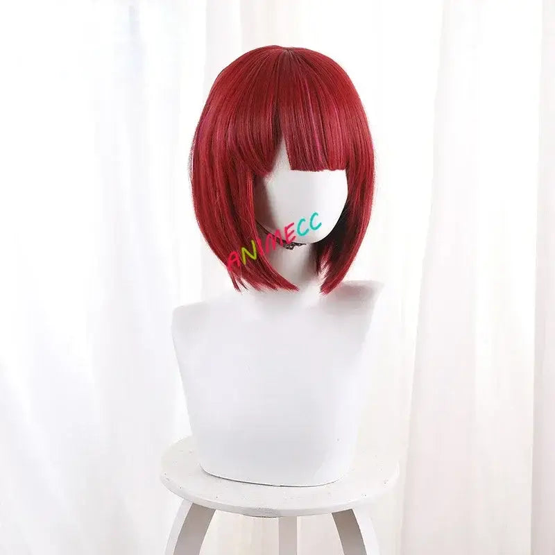 Vibrant red straight bob stage dress wig with blunt-cut bangs on white mannequin head xs-2xl sizing