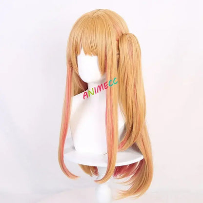 Long golden blonde cosplay stage dress wig with soft pink highlights and bangs styled in two high pigtails