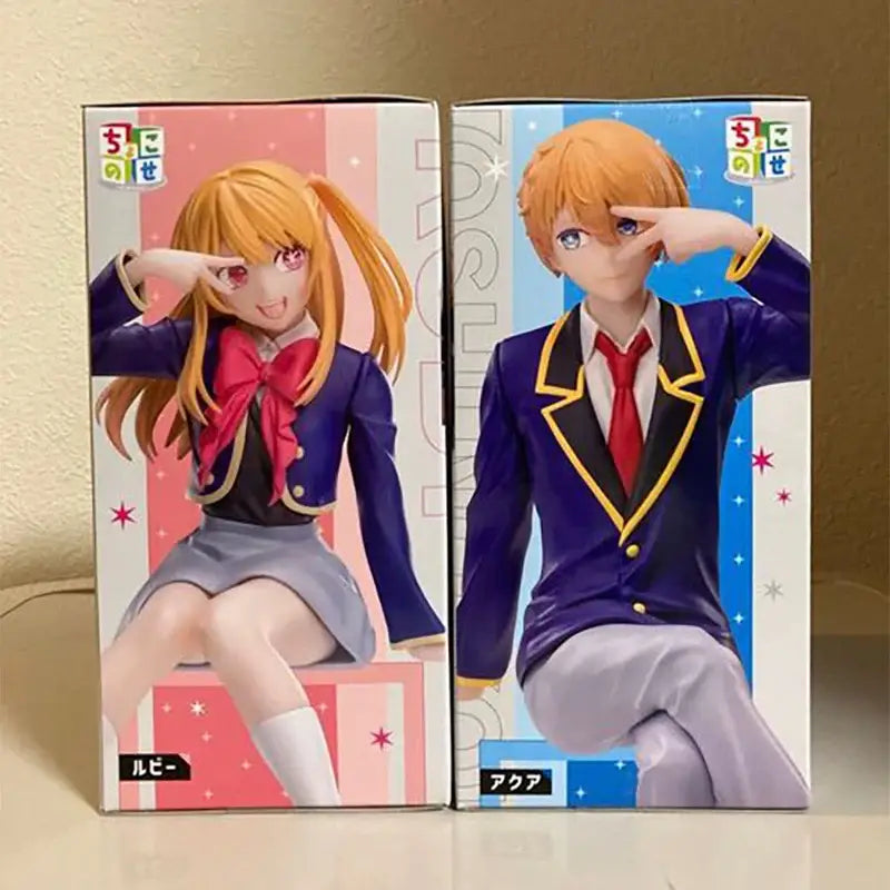 Two anime pvc figures in school uniforms featuring ruby pvc figure with orange pigtails and red bow
