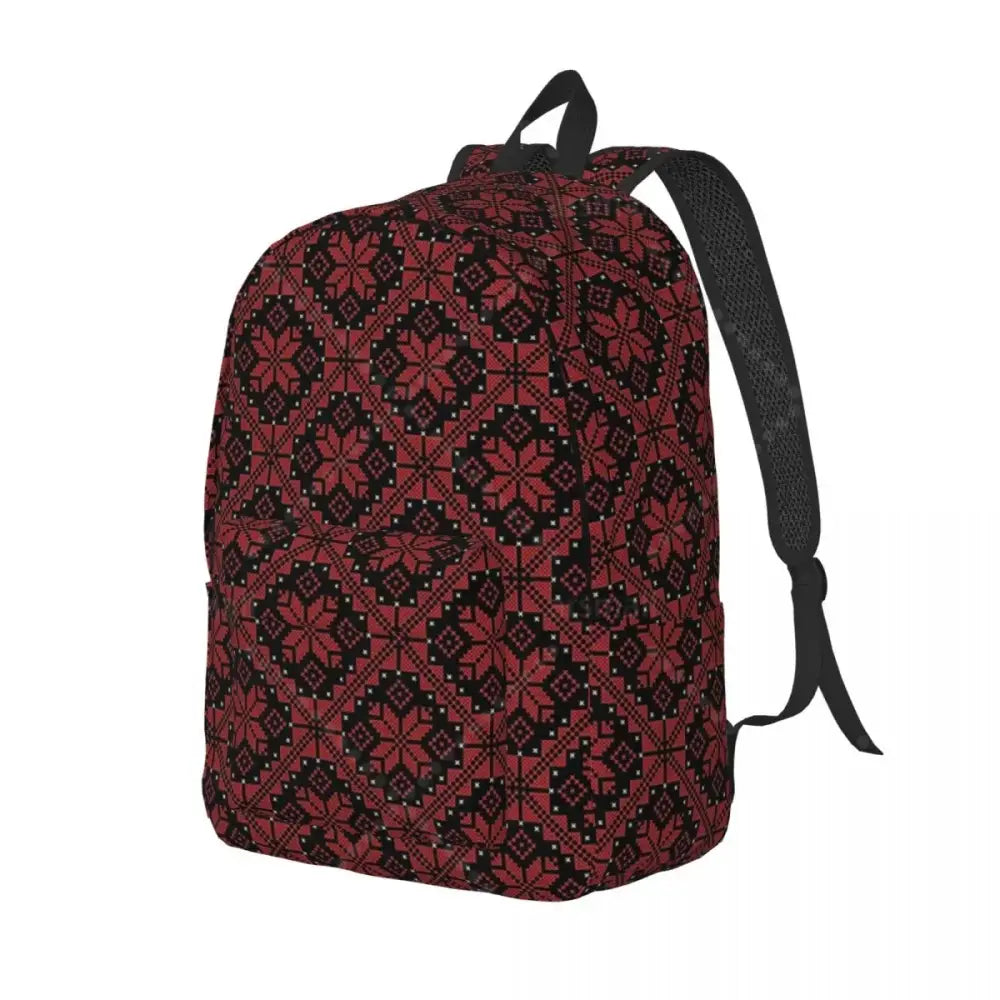 Palestinian tatreez backpack embroidered canvas laptop bag in red and black with geometric snowflake pattern