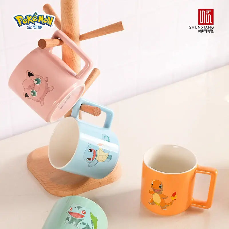 Pink ceramic mug featuring a cartoon illustration of the pokémon jigglypuff for coffee or tea use