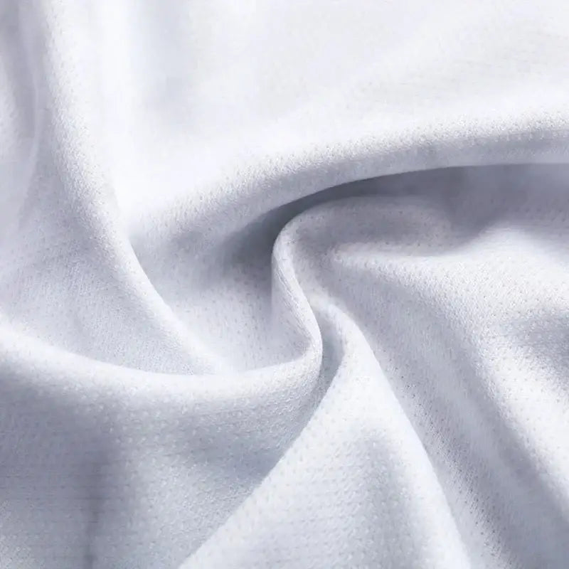 Soft white textured fabric with subtle woven pattern on the Pokémon Eevee quick-dry t-shirt for parent and child
