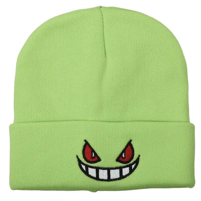 Lime green knit winter hat featuring an embroidered gengar face with red eyes and a wide toothy grin