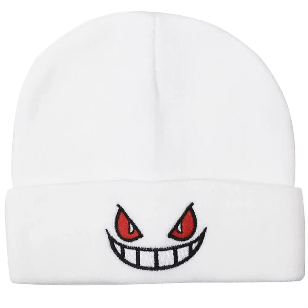 White knit winter hat featuring an embroidered gengar face with red eyes and a wide toothy grin