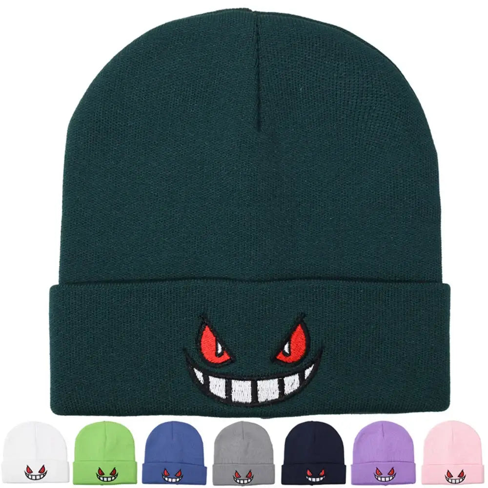 Dark green knit winter hat featuring an embroidered gengar face with red eyes and white teeth