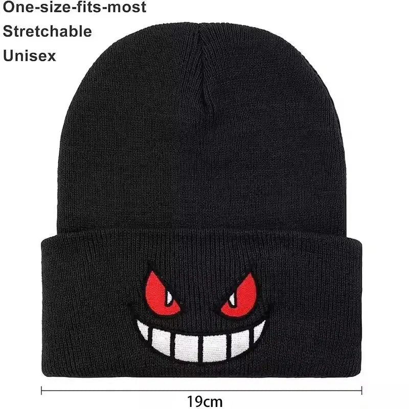 Black knitted beanie winter hat featuring pokemon gengar face with embroidered glowing red eyes and white teeth