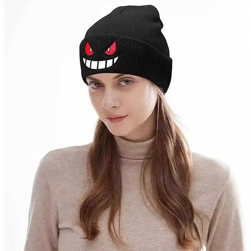 Black knitted beanie featuring an embroidered red-eyed toothy grin design pokemon gengar winter hat