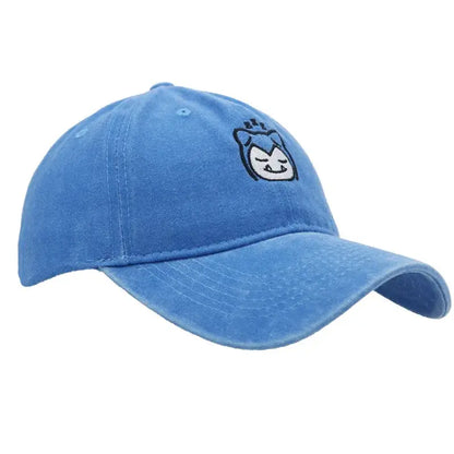 A light blue denim knitted hood hat with a small embroidered kawaii character face and crown plush style