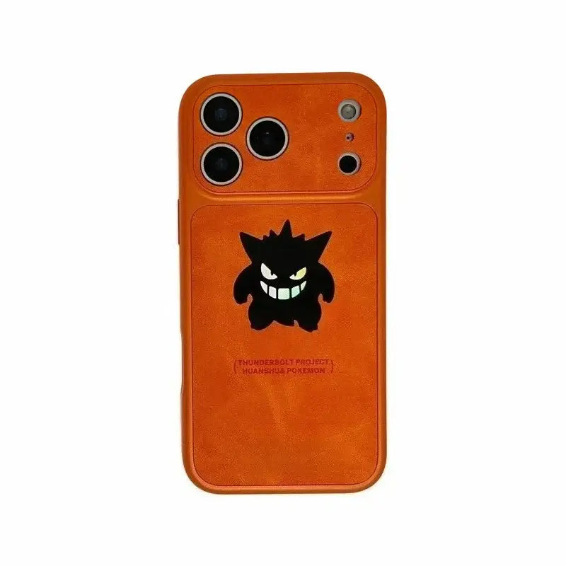 Orange textured phone case with black gengar featuring glowing white eyes and teeth in laser leather texture back view