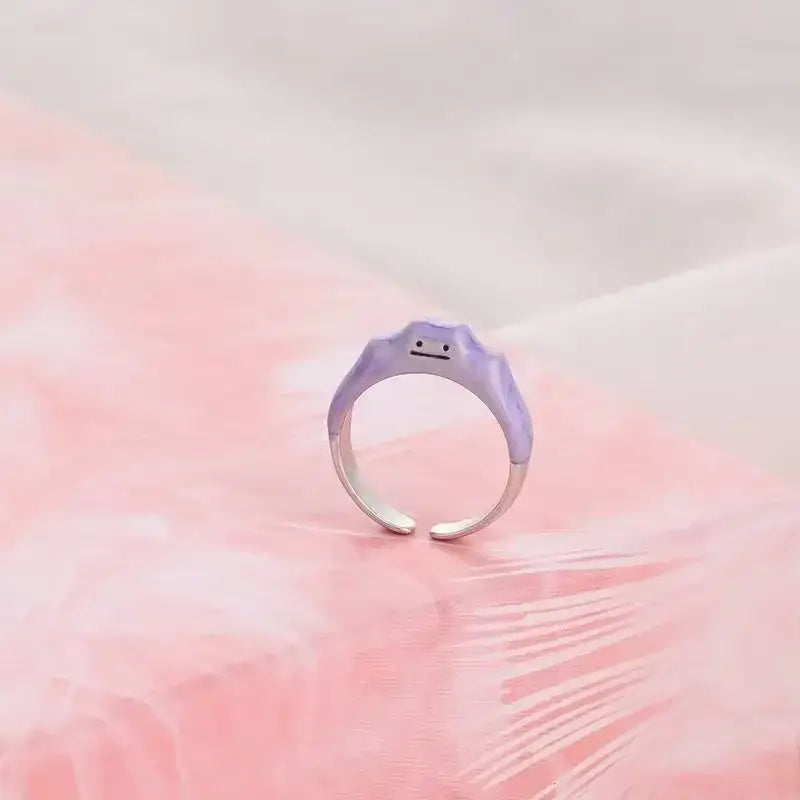 Lavender matte finished 925 silver couple ring with a minimalist face design from the pokemon litwick dragonair collection