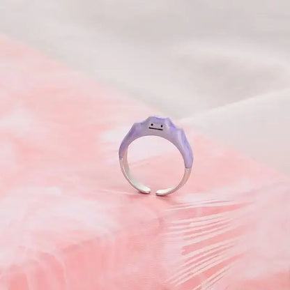 Lavender matte finished 925 silver couple ring with a minimalist face design from the pokemon litwick dragonair collection