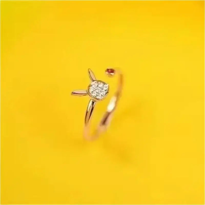 Delicate gold-toned 925 silver couple ring with diamond cluster bunny ears and red gemstone inspired by Pokemon Litwick Dragonair