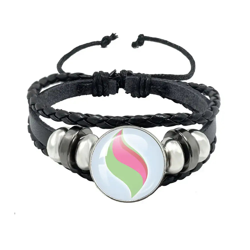 Pokemon mega stone keychain featuring black leather rope bracelet with silver beads and pink green charm