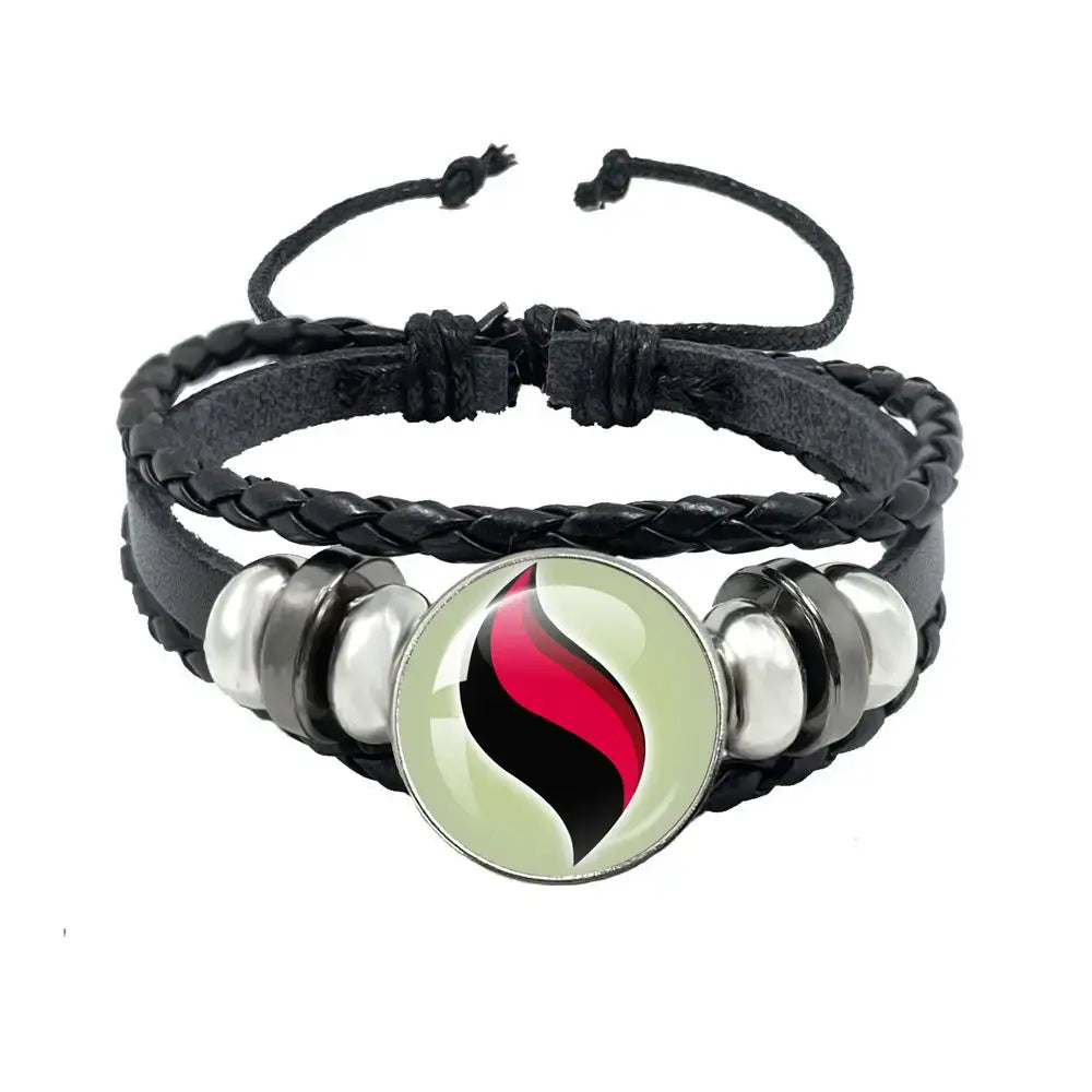 Pokemon mega stone keychain 10cm black leather rope bracelet with braided black leather and flame charm on light green background