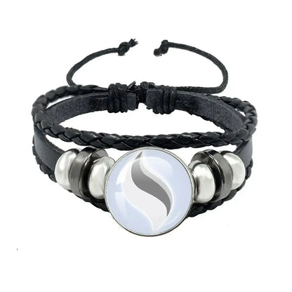 Pokemon mega stone keychain featuring black leather rope bracelet with silver s charm and metallic beads