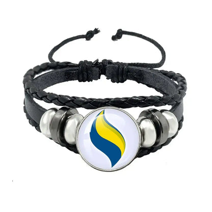 Pokemon mega stone keychain featuring black braided leather rope with silver beads and a blue yellow flame charm