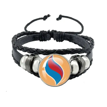 Pokemon mega stone keychain featuring black leather rope braided bracelet with silver beads and flame design centerpiece
