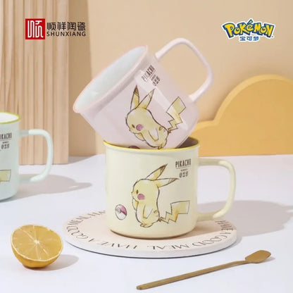 Cream-colored ceramic mug featuring a kawaii yellow pikachu ceramic design with pikachu printed nearby