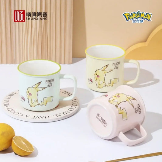 Pastel-colored pikachu ceramic mug with yellow rim featuring shunxiang and pokémon logos in kawaii pattern design