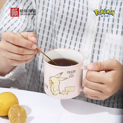 Pink ceramic pikachu ceramic mug with yellow pikachu illustration and matching pink rim kawaii pattern