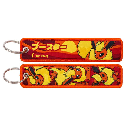Pokemon pikachu embroidered keychain featuring an orange and red flareon with yellow fur black accents and japanese text