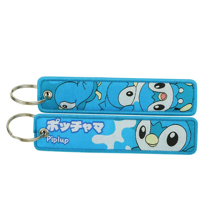 Blue embroidered pokemon pipipup keychain cartoon design jet tag accessory for backpacks and keys