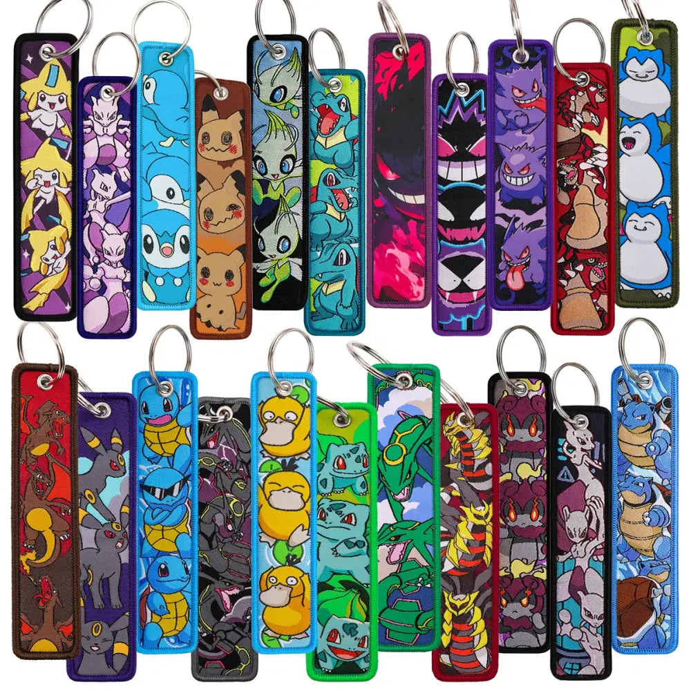 A collection of colorful rectangular pokemon pikachu embroidered keychains with vibrant designs for jet tag accessories
