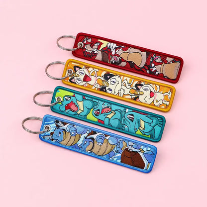 Four rectangular pokemon pikachu embroidered keychains in vibrant colors with visible stitched thread for jet tag accessory