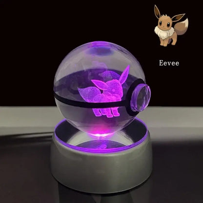 Purple glowing eevee figurine inside transparent pokeball crystal ball led night light with black band and silver base