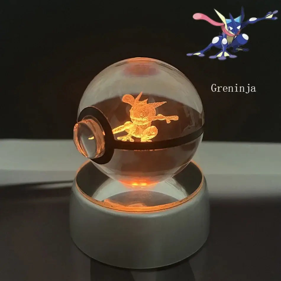 Pokemon pokeball led night light with a glowing orange greninja figure inside a transparent crystal ball lamp