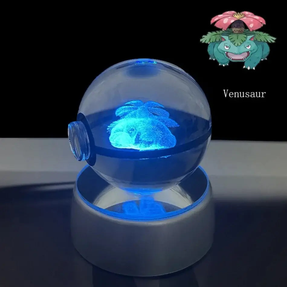 Pokemon pokeball led night light featuring a glowing blue venusaur figurine inside a crystal ball with illuminated base