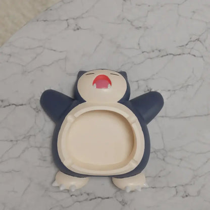 Pokemon Snorlax ashtray ornament in navy blue cream with red mouth designed as playful desktop decor accessory
