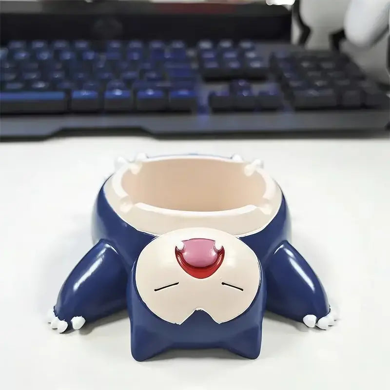 Blue and white pokemon snorlax ashtray ornament with a red nose designed as desktop decor