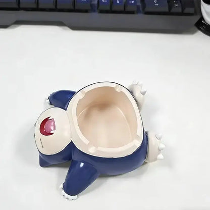 Blue and white snorlax-shaped ceramic ashtray ornament with red eye detail for desktop decor and smoking accessories