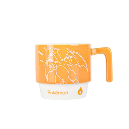 Orange and white two-toned ceramic mug featuring charizard line art and pokémon logo for stackable kawaii style use