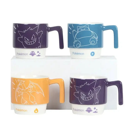 Set of four Pokémon-themed ceramic mugs with white line art on colored ceramic featuring Snorlax and others