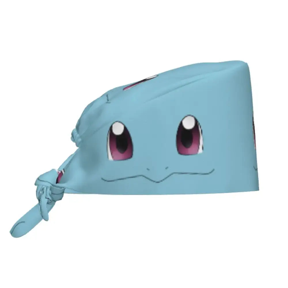 Light blue cotton surgical scrub cap featuring a printed face of Pokémon Squirtle with large pink and black eyes