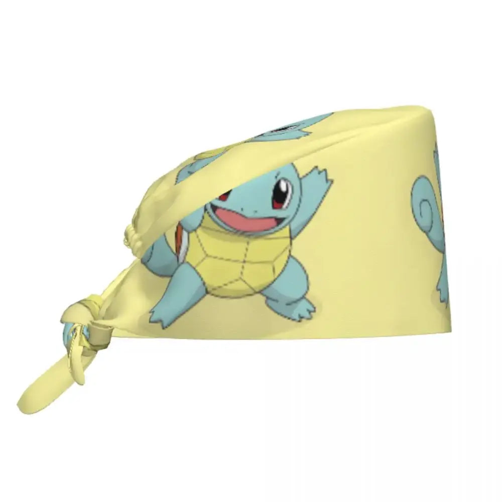 Yellow cotton surgical scrub cap featuring a cartoon squirtle illustration for medical use