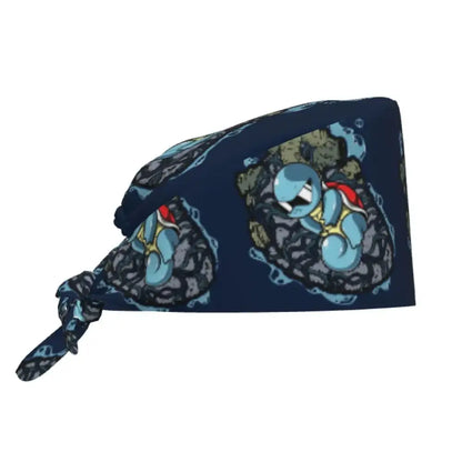 Dark blue cotton surgical scrub cap featuring a repeating squirtle pattern with light blue and red shell accents
